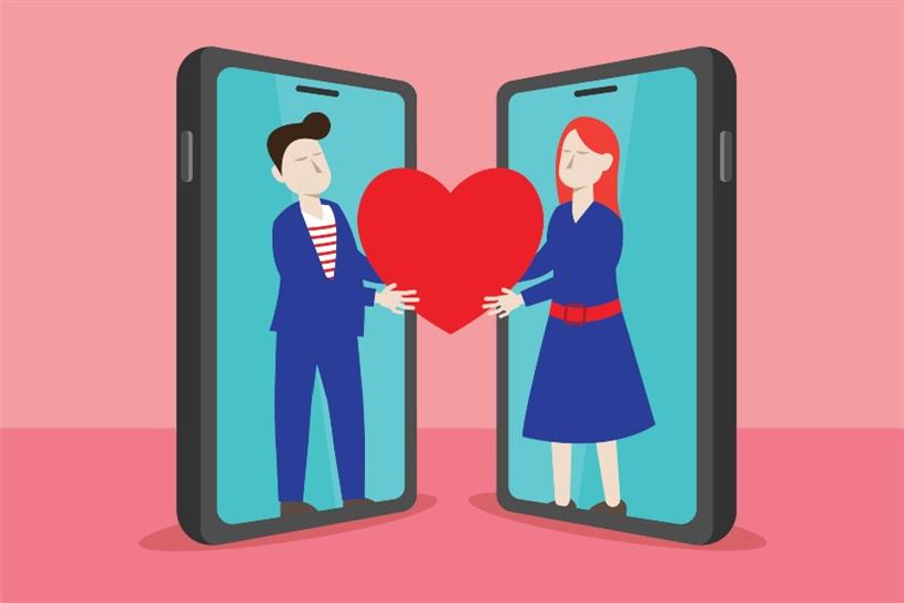Two animated people holding a heart through phones